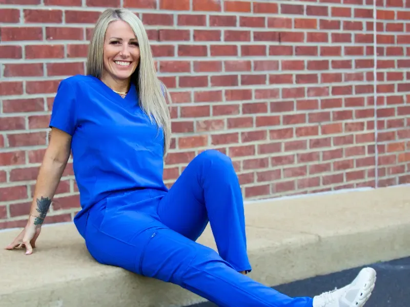 Woman in trendy scrubs.